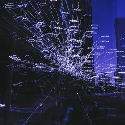 Abstract image of light trails, symbolizing the flow of energy and movement.